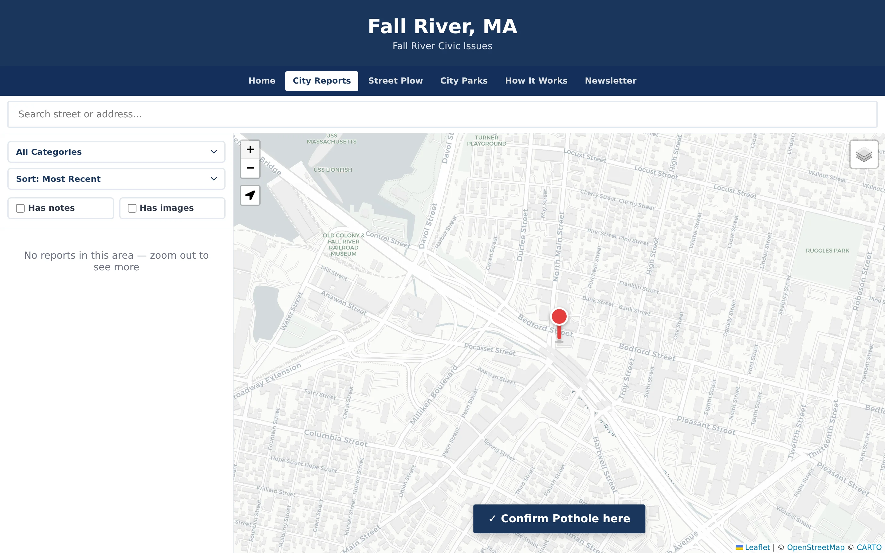 Street-level map with a red pin marking the reported location and a button reading Confirm Pothole here.